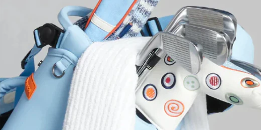 An image of golf irons in a Stitch Golf bag